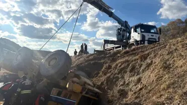 Eskişehir'de İş Makinesi Devrildi, Operatör Kurtarıldı