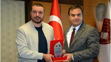Muhtarlara Plaket Takdimi