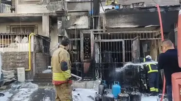 Hatay'da iş yerinde çıkan yangın, üst kattaki daireye sıçradı
