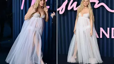 Ünlü oyuncu hamileliğini tül elbisesiyle kırmızı halıda duyurdu