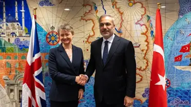 Fidan ve Cooper Brüksel'de Görüştü