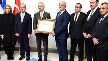 Başkan Er'den Bakan Uraloğlu'na 'Fahri Hemşehrilik Beratı'