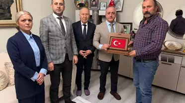 Beypazarı'da MHP'li yöneticiler ilk iftarını şehit babasının evinde yaptı