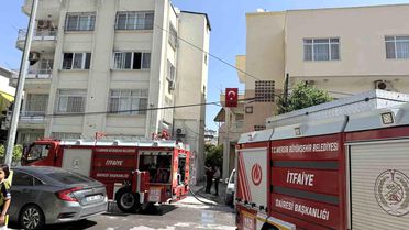 Tarsus'ta apartman dairesinde yangın paniği
