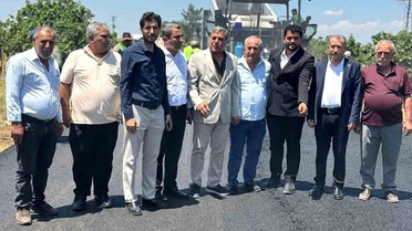 Yoğun yağış döneminde tahrip olan yollar asfaltlandı, vatandaşlar adak kurbanı kesti