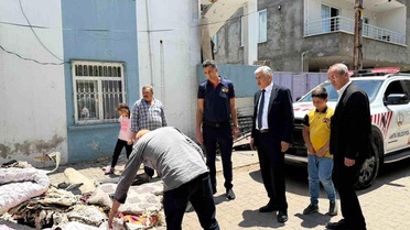 Başkan Hallaç, yangın mağduru aileyi yalnız bırakmadı
