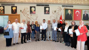 Aksu'da 12 vatandaş tapularıyla buluştu