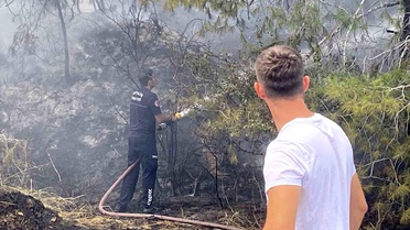 Antalya'da ormanlık alandaki yangın büyümeden söndürüldü