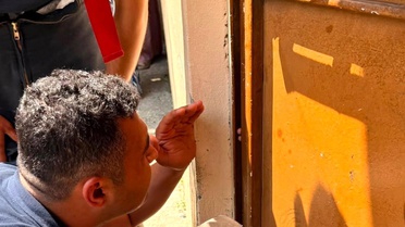 Hatay'da Çocuk Demir Kapıda Sıkıştı