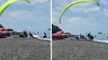 Plajda kontrolden çıkan motorlu paraşüt kalabalığa daldı: 3 yaralı