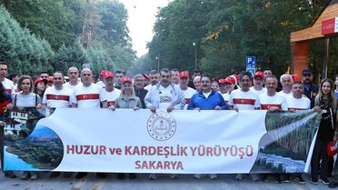 Bakan Tekin Huzur Yürüyüşüne Katıldı