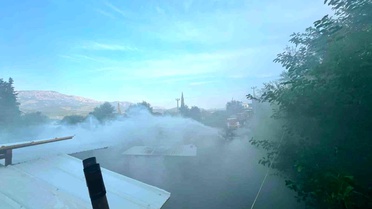 Odun ateşinden sıçrayan kıvılcımlar yangına neden oldu