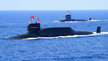 Çin'den dünyaya gözdağı! Denizaltından balistik füze fırlattı