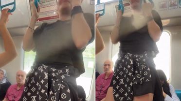 Marmaray'da pes dedirten görüntü! Yolculara aldırış etmeden barfiks çekti