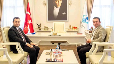 Kaymakam Temel'in ilk ziyareti Başkan Dökmeci'ye