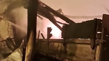 Gölpazarı'nda Yangın: Buğday Ambarı ve Römork Zarar Gördü