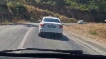 Marmaris’te ormana sigara izmariti atan sürücüyü güvenlik kamerası yakalattı
