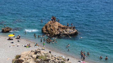 Antalya'da Sıcak Hava Sahili Doldurdu