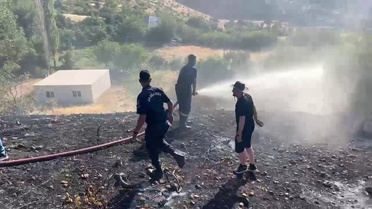 Sincik'te örtü yangını kontrol altına alındı
