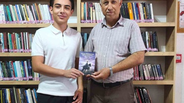 Bor'da Genç Tarihçiden Yazara Kitap Takdimi