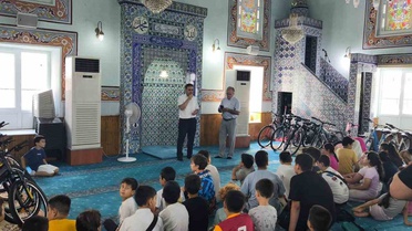 Çine'de Yaz Kur'an Kursu Kapanışında Öğrencilere Bisiklet