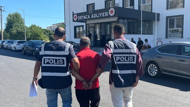 Muğla Dalaman'da 18 yıl 4 ay cezası bulunan hükümlü yakalanıp cezaevine gönderildi