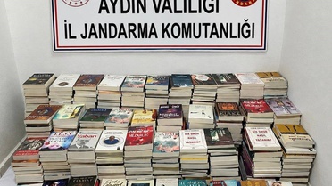 Kuşadası Güzelçamlı'da iki işletmede 658 bandrolsüz kitap ele geçirildi
