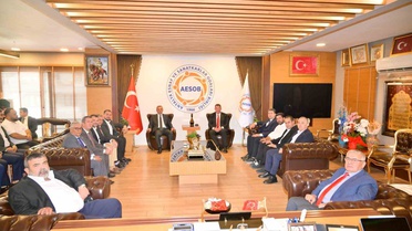 Vali Şahin, AESOB Başkanı Dere'ye tebrik ziyaretinde bulundu