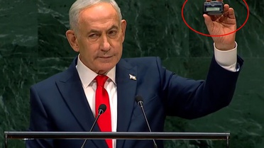 Boş salon ayarlarını bozdu! Netanyahu dünyayı elindeki cihazla tehdit etti