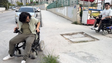 Kadirli'de polinöropati hastası Furkan Ulusoy, arkadaşıyla farkındalık videosu çekti