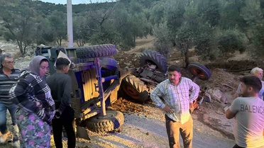 Aydın Bozdoğan'da patika yoldan inen traktör devrildi, sürücü yaralandı