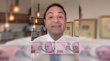 Akdoğan, iddia edilen 22 milyar dolarlık vurgunu 200 TL'lik banknotlarla anlattı