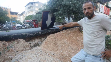 Hatay Defne'de kaza yokuşundaki asfaltta boşluklar oluştu, istinat duvarı isteniyor