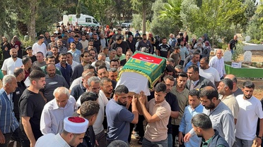 Girne'de alabora olan gemide ölen 12 yaşındaki çocuk kardeşinin yanına defnedildi
