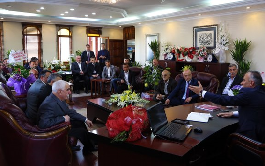 MHP İlçe Teşkilatı ve Meclis Üyeleri Başkan Dr. Yılmazer'i Ziyaret Etti