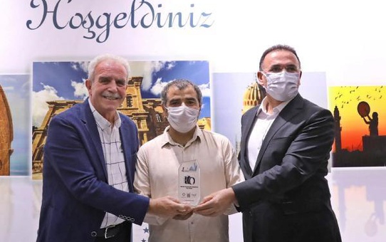 DHA MARDİN MUHABİRİ SELİM KAYA'NIN FOTOĞRAFINA ÖZEL ÖDÜL