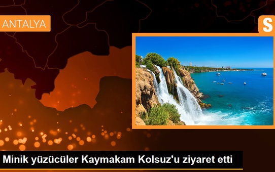 Minik yüzücüler Kaymakam Kolsuz'u ziyaret etti