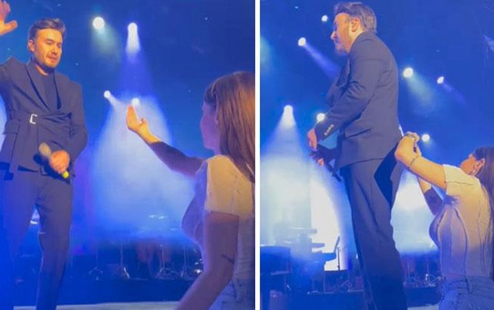 Selin İmer, konser sırasında eşi Mustafa Ceceli'nin imdadına koştu! Sahnede kıyafetinden rahat edemeyen Ceceli'nin ceketinin yırtmacını yıttı
