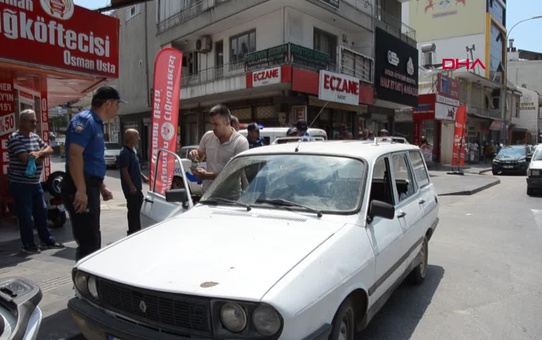 Antalya'da otomobil sürücüsü seyir halindeyken av tüfeği ateş aldı