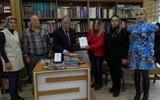 Prof. Dr. Erol Kürkçüoğlu'na Onur Plaketi