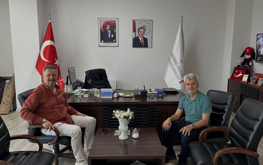 AK Parti'li Özcan, İl Göç İdaresi Müdürü Gümüş'ü ziyaret etti