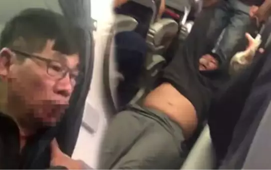 Yolcuyu Uçaktan Sürükleyerek Çıkaran Görevli Atıldığı Şirkete Dava Açtı