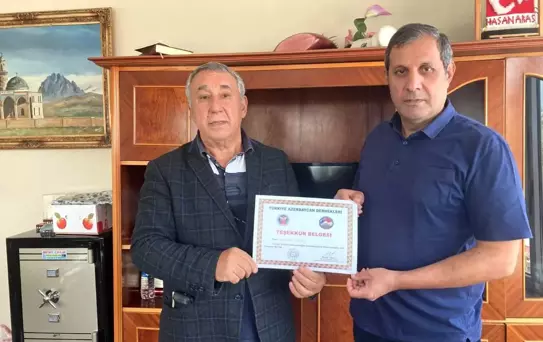 Ünsal'dan Aras'a teşekkür belgesi