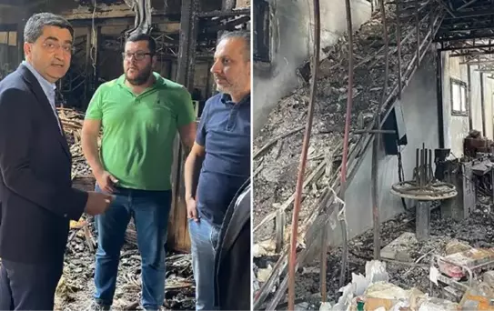 CHP milletvekili adayı Mehmet Emin Ekmen, Mersin'de dükkanları kül olan esnafı ziyaret etti