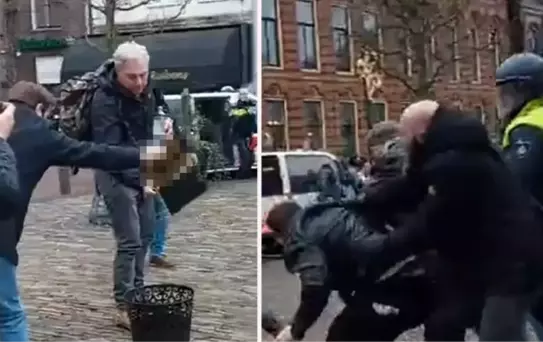 Hollanda'da Kur'an-ı Kerim'in yakılmasına engel olmak isteyen protestoculara polisten sert müdahale