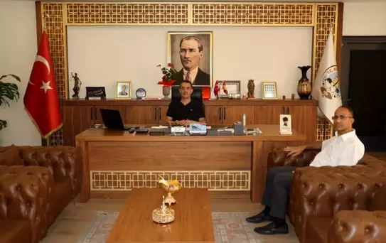 Koçarlı Kaymakamı Ersin Tepeli, Belediye Başkanı Özgür Arıcı'ya veda ziyaretinde bulundu