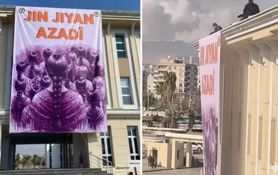 DEM Partili Cizre Belediyesi'ne asılan pankartı polis indirdi