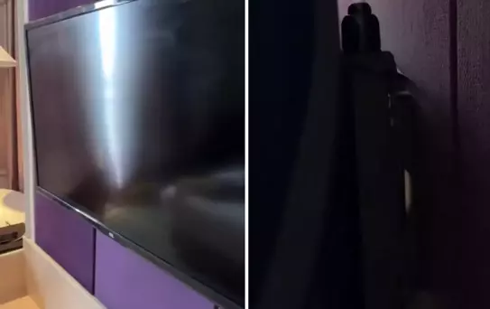 Otel odasında, televizyonun arkasına bakan adam, hayatının şokunu yaşadı