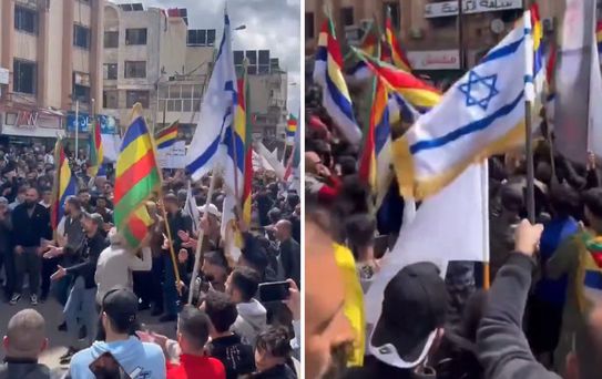 Suriye'nin güneyinde bir grup Dürzi, ülkeden ayrılma talebiyle İsrail bayraklı gösteri düzenledi