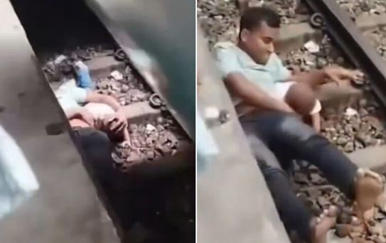 Mucize kurtuluş! Raylara düşen çocuğunu kucağına aldı, üzerinden vagonlar geçti